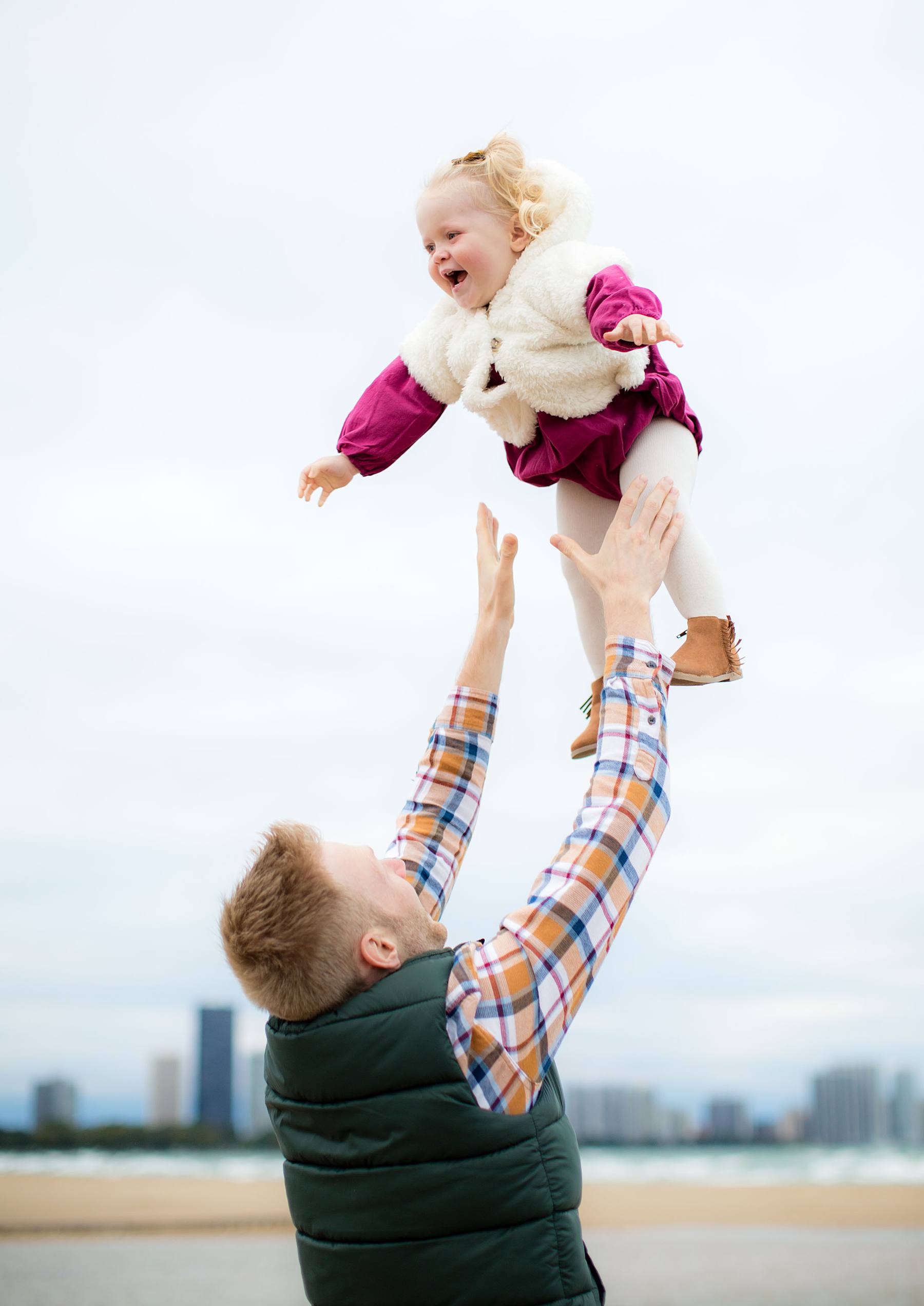 Chicago Family Photographer at Montrose Beach with Toddler for Fall Portraits